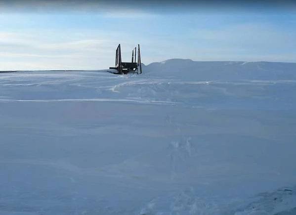 Staircase through cable corridor in winter conditions demonstrating year-round operation capability