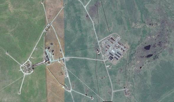 Google Maps satellite view of Norilsk Vega system showing small cross and technical position locations
