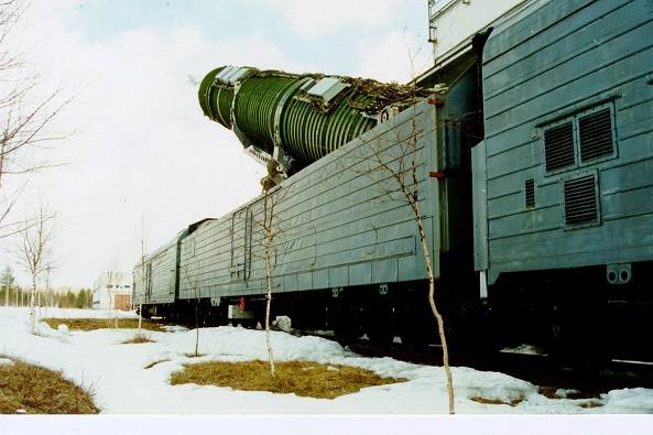 Rail-mobile ICBM system crew preparing missile for launch sequence