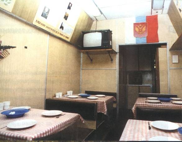 Interior of rail-mobile ICBM train showing personnel mess hall and living quarters