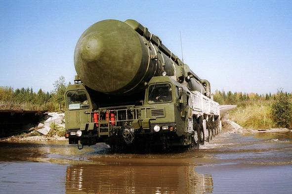 Topol-M mobile launcher crossing water obstacle during field deployment exercise