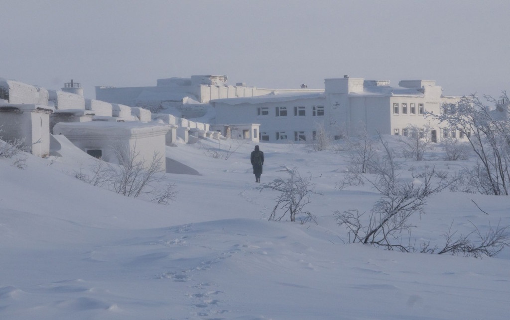 Engineer returning to technical facility